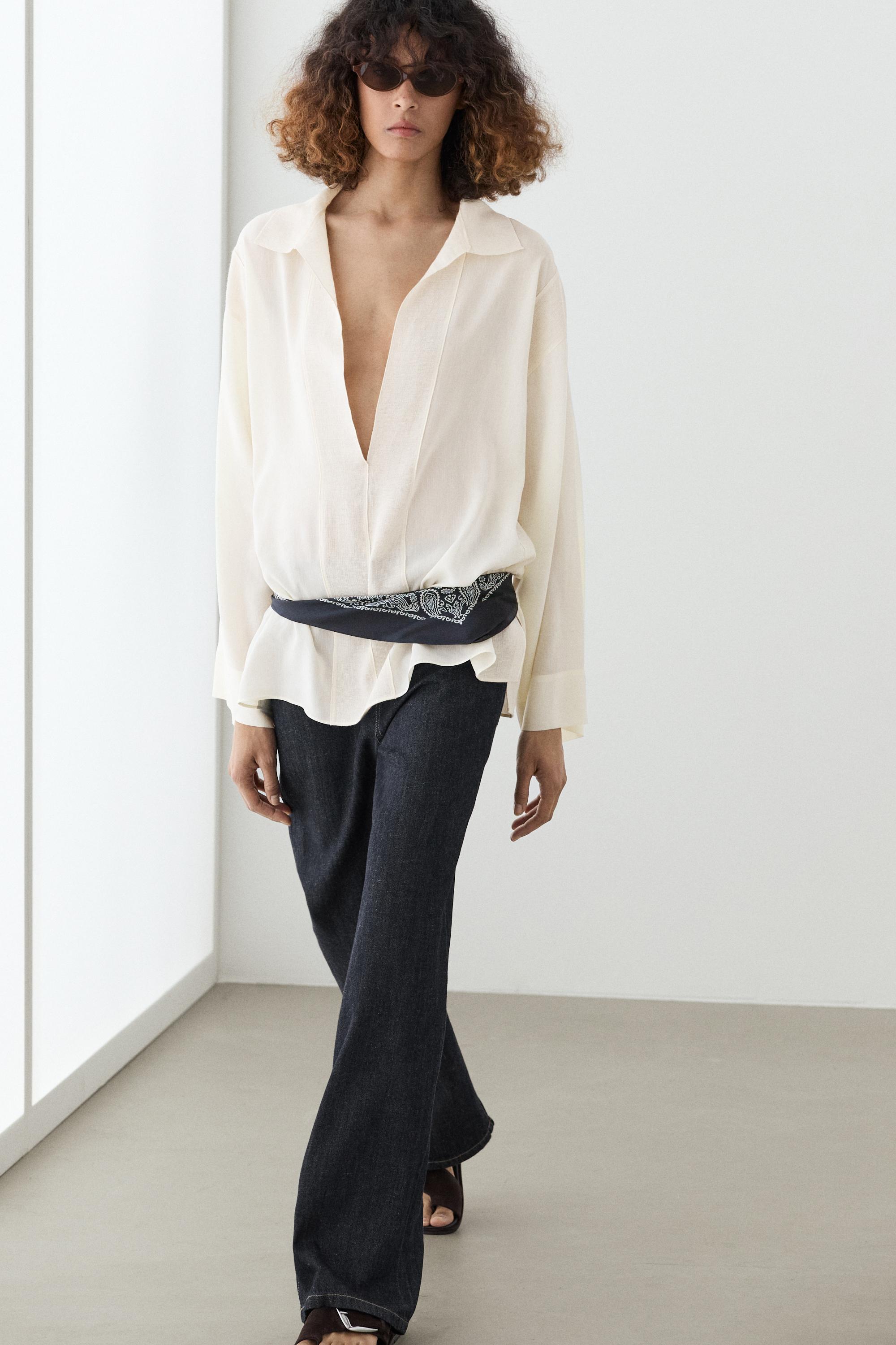 Flowing blouse with seam details